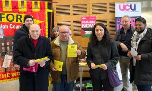members campaigning with banners